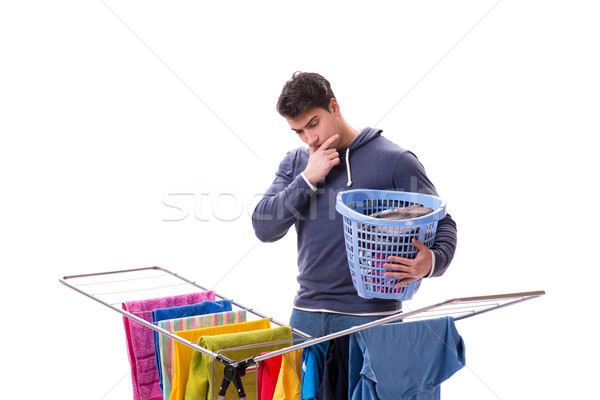 Husband man doing laundry isolated on white Stock photo © Elnur