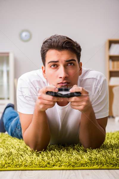 Stock photo: Man addicted to computer games