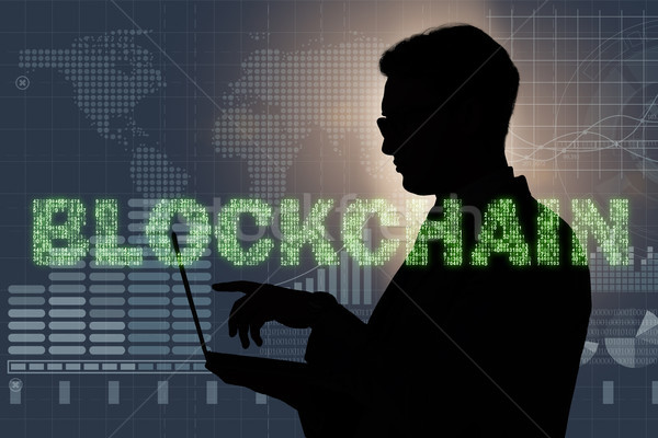 Businessman in blockchain cryptocurrency concept Stock photo © Elnur