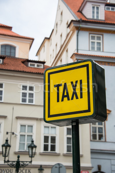 Stockfoto: Taxi · teken · daglicht · weg · stad · straat