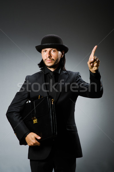 Businessman wearing vintage concept with briefcase Stock photo © Elnur