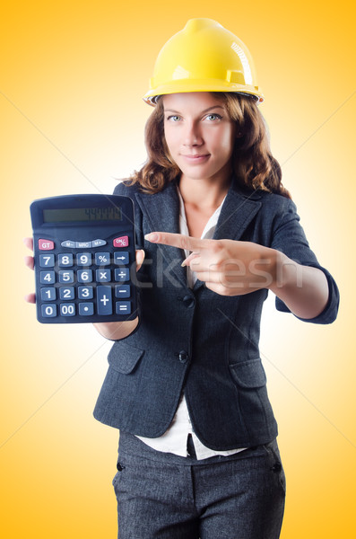 Foto stock: Femenino · constructor · calculadora · blanco · construcción · trabajo