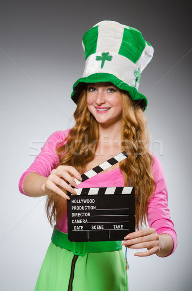 Woman with movie board in saint patrick concept Stock photo © Elnur