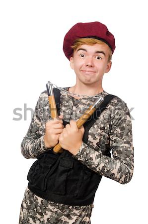 Young man in military uniform holding gun isolated on white Stock photo © Elnur