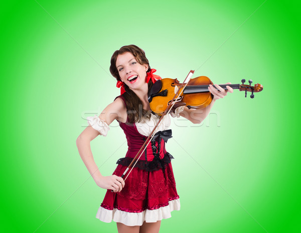 Young woman playing violin against gradient  Stock photo © Elnur