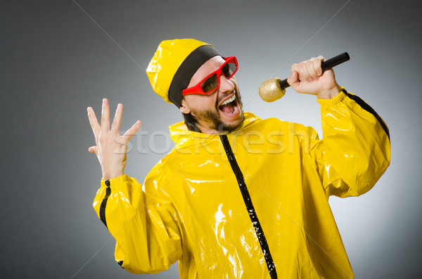 Férfi visel citromsárga öltöny buli tánc Stock fotó © Elnur