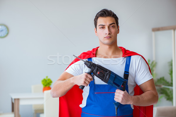 Super hero repairman working at home Stock photo © Elnur