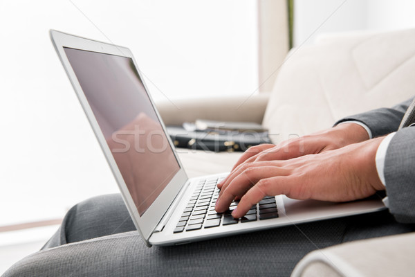 Businessman working with laptop in business concept Stock photo © Elnur