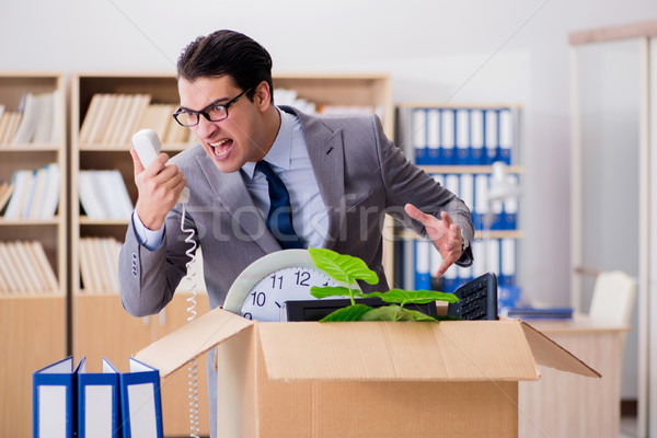 Man moving office with box and his belongings Stock photo © Elnur