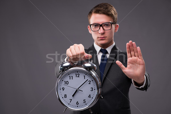 The businessman in time management concept Stock photo © Elnur