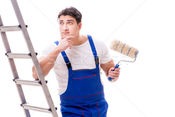 Young painter man with ladder isolated on white background Stock photo © Elnur