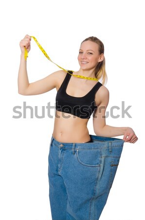 Young girl with centimeter in dieting concept Stock photo © Elnur