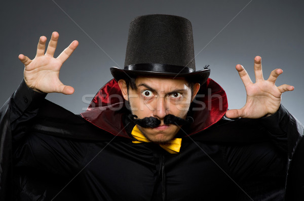 Funny magician man wearing tophat Stock photo © Elnur