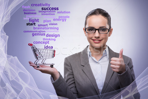 The young businesswoman with shopping cart Stock photo © Elnur