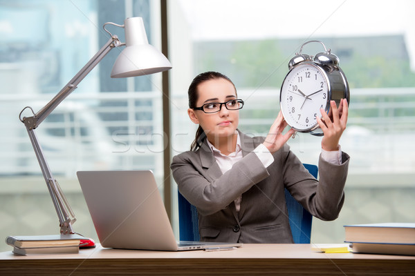 Stockfoto: Zakenvrouw · voldoen · deadlines · business · gelukkig · klok