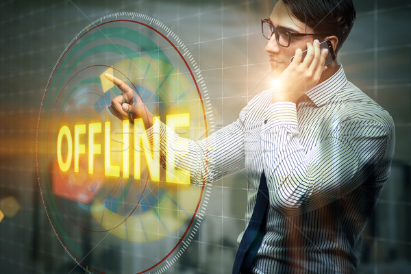 Businessman pressing virtual button offline Stock photo © Elnur