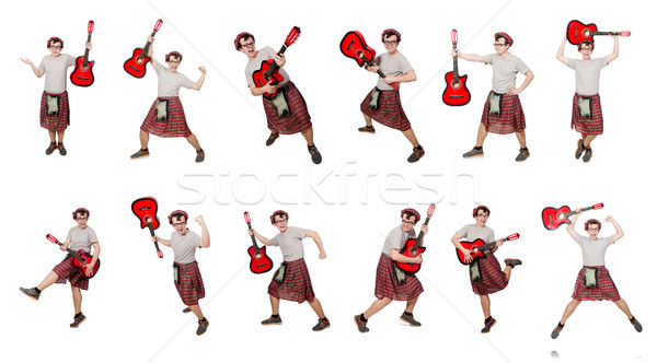 The scotsman playing guitar isolated on white Stock photo © Elnur