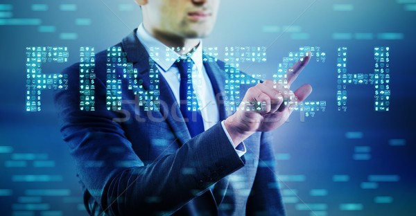 Businessman pressing buttons in fintech concept Stock photo © Elnur