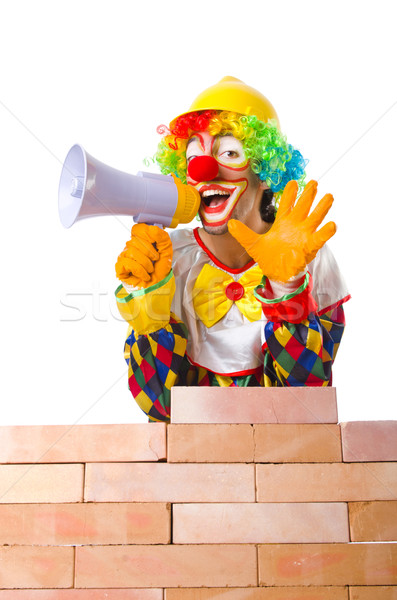 Bad construction concept with clown laying bricks Stock photo © Elnur