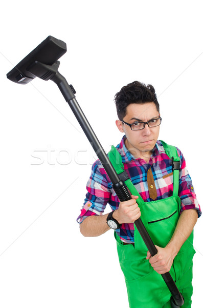 Funny man in green coveralls vacuum cleaning Stock photo © Elnur