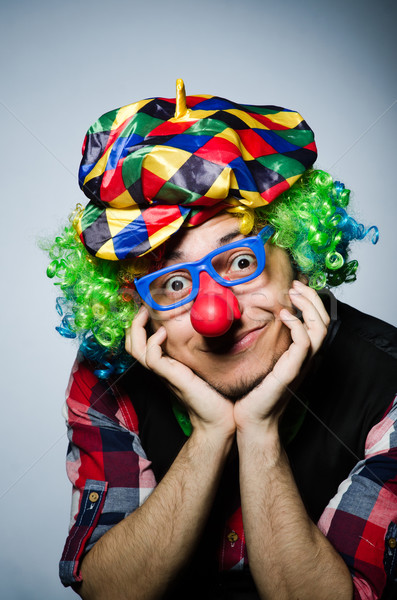 Funny clown against the dark background Stock photo © Elnur