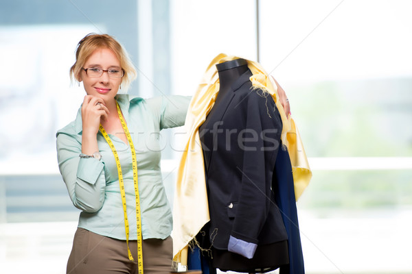Woman tailor working on new clothing Stock photo © Elnur