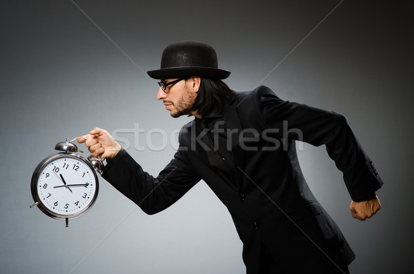 Człowiek zegar vintage hat biznesmen Zdjęcia stock © Elnur