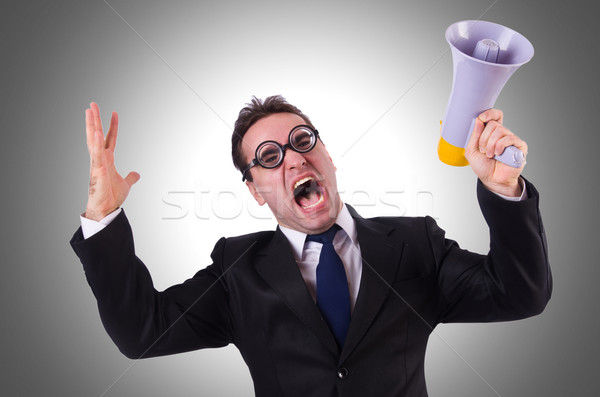 Young businessman with loudspeaker on white Stock photo © Elnur