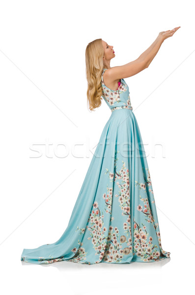 Woman in blue long dress with flower prints isolated on white Stock photo © Elnur