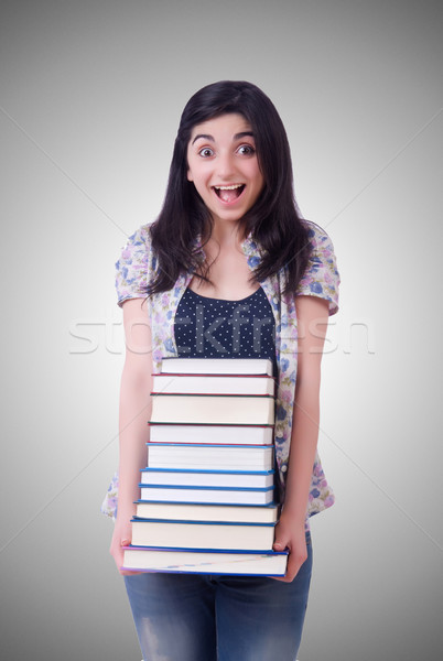 Girl student with books on white Stock photo © Elnur