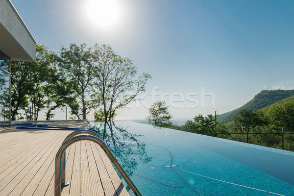 Infinito piscina brillante verano día cielo Foto stock © Elnur