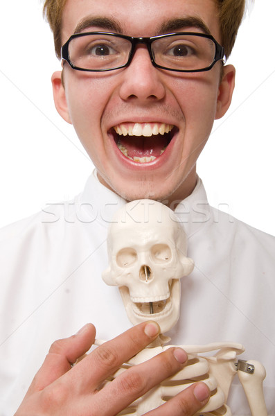 Funny doctor with skeleton isolated on white Stock photo © Elnur