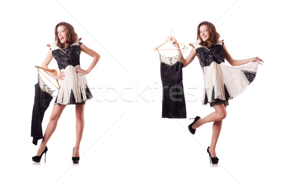 Young woman trying new clothing on white Stock photo © Elnur