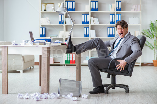 Angry businessman shocked working in the office fired sacked Stock photo © Elnur