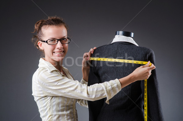 Woman tailor working on clothing Stock photo © Elnur