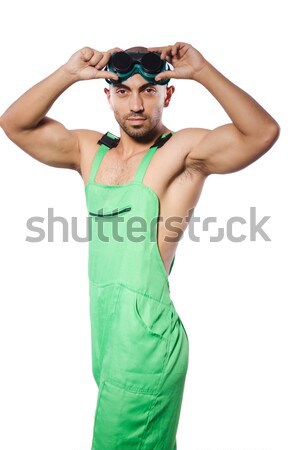 Man in green coveralls with goggles Stock photo © Elnur