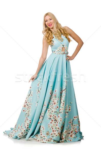Stock photo: Woman in blue long dress with flower prints isolated on white