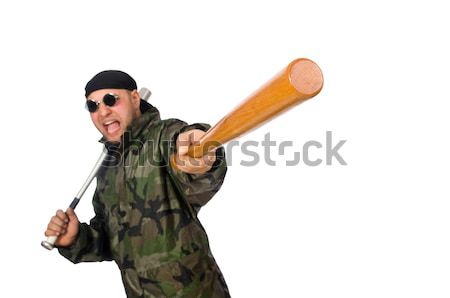 Young man in military uniform holding gun isolated on white Stock photo © Elnur