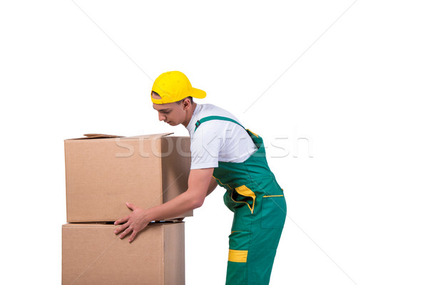Stock photo: Young man moving boxes with cart isolated on white