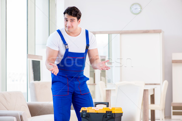 Furniture repairman working in store Stock photo © Elnur