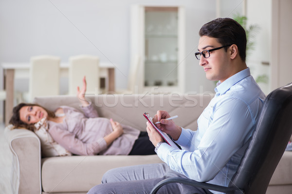 Stock photo: Pregnant woman visiting psychologist doctor