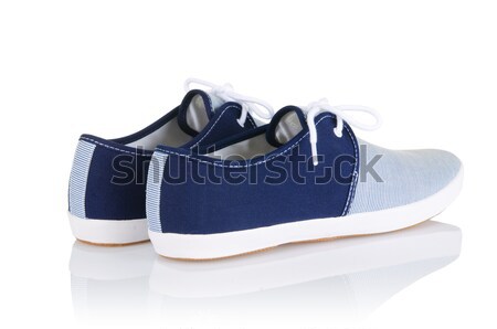 Sporty shoes in sport shoes concept on white Stock photo © Elnur