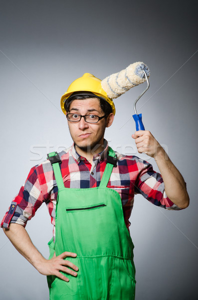Stock photo: Funny painter with hardhat and roller