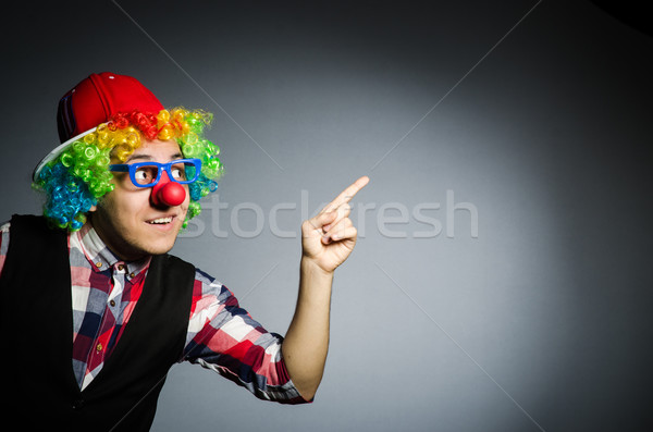 Funny clown against the dark background Stock photo © Elnur