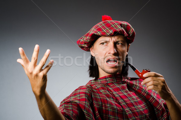 Funny scotsman with smoking pipe Stock photo © Elnur