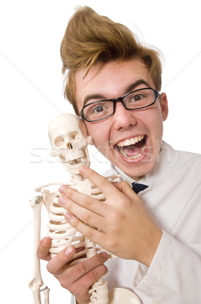 Funny doctor with skeleton isolated on white Stock photo © Elnur