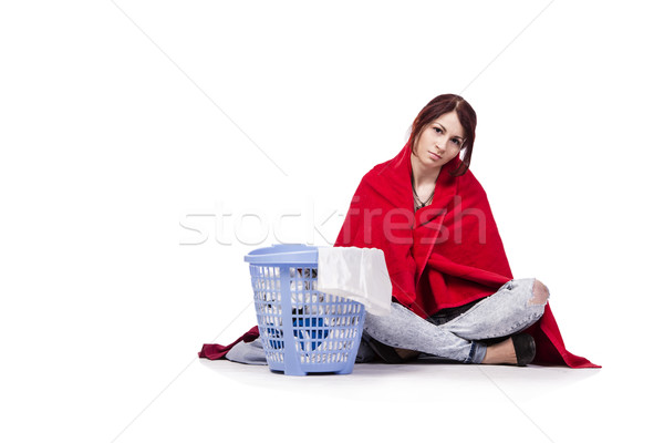 Woman tired after doing laundry isolated on white Stock photo © Elnur