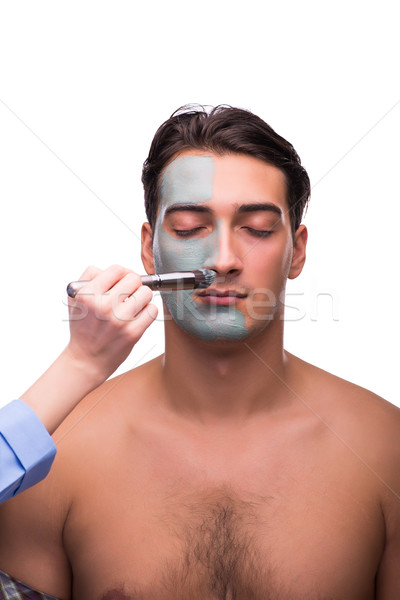 Man with face mask being applied on white Stock photo © Elnur