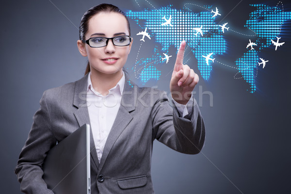Imprenditrice viaggi aerei computer donna mondo web Foto d'archivio © Elnur