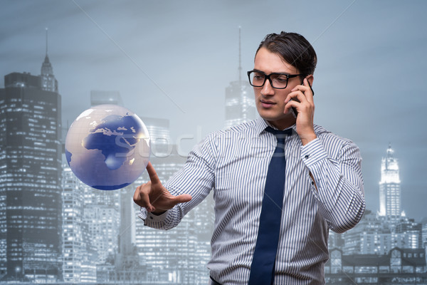 Businessman in global business concept Stock photo © Elnur